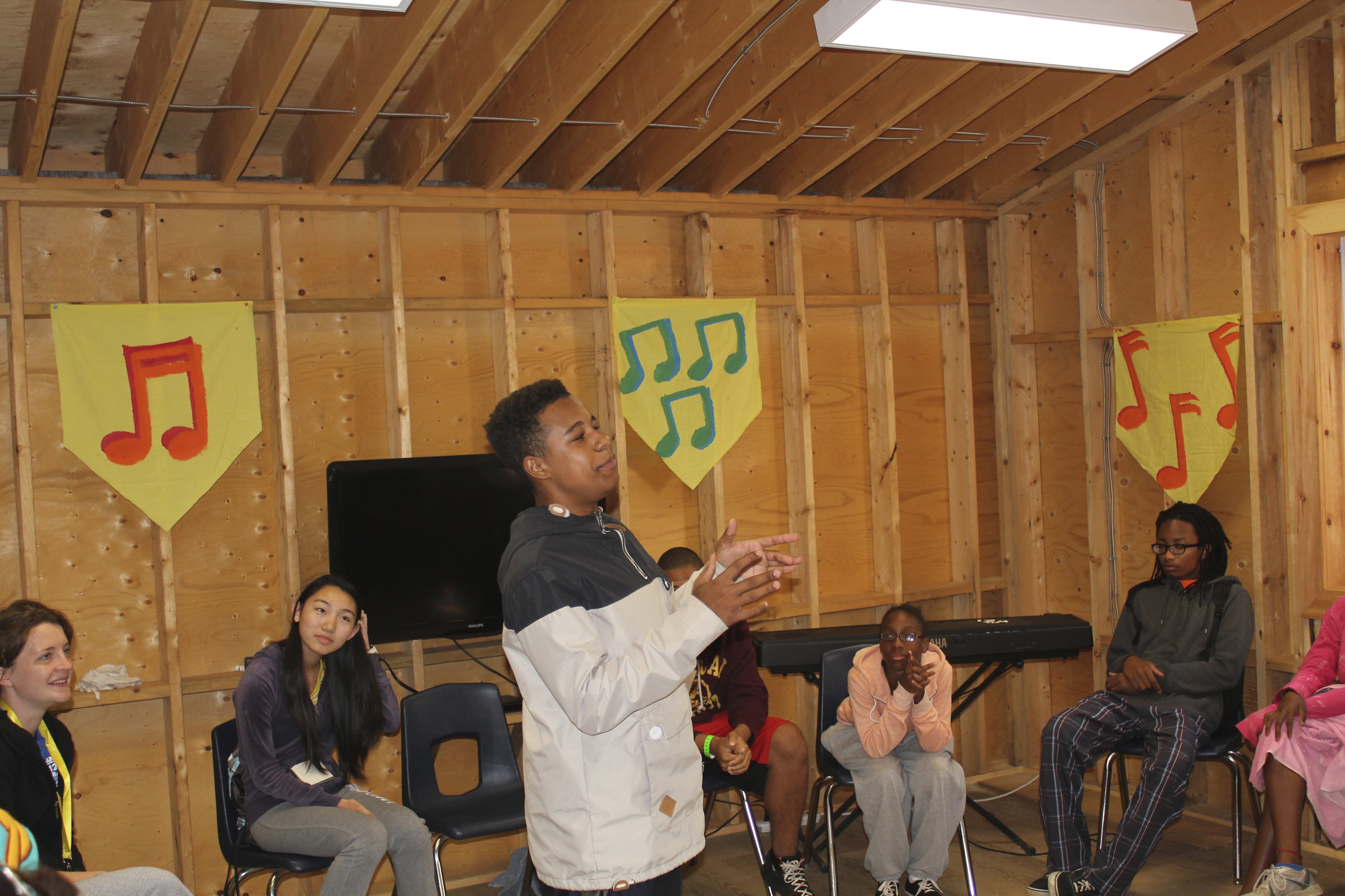 Joey leading camp music session
