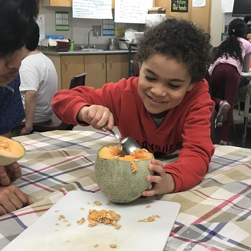 after-school programs online BLAST boy making a fruit cup