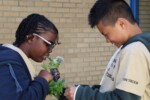 Planting the community garden LED kids planting a garden - community volunteer day