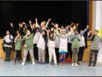 LED kids celebrate completing their program