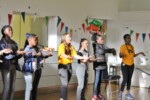 campers and staff perform a campfire song at festi-fall 2019